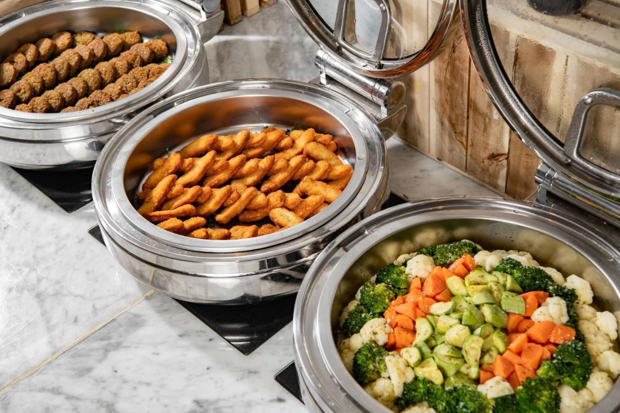Park Inn By Radisson Makkah Aziziyah Mekka Eksteriør bilde Buffet at a hotel