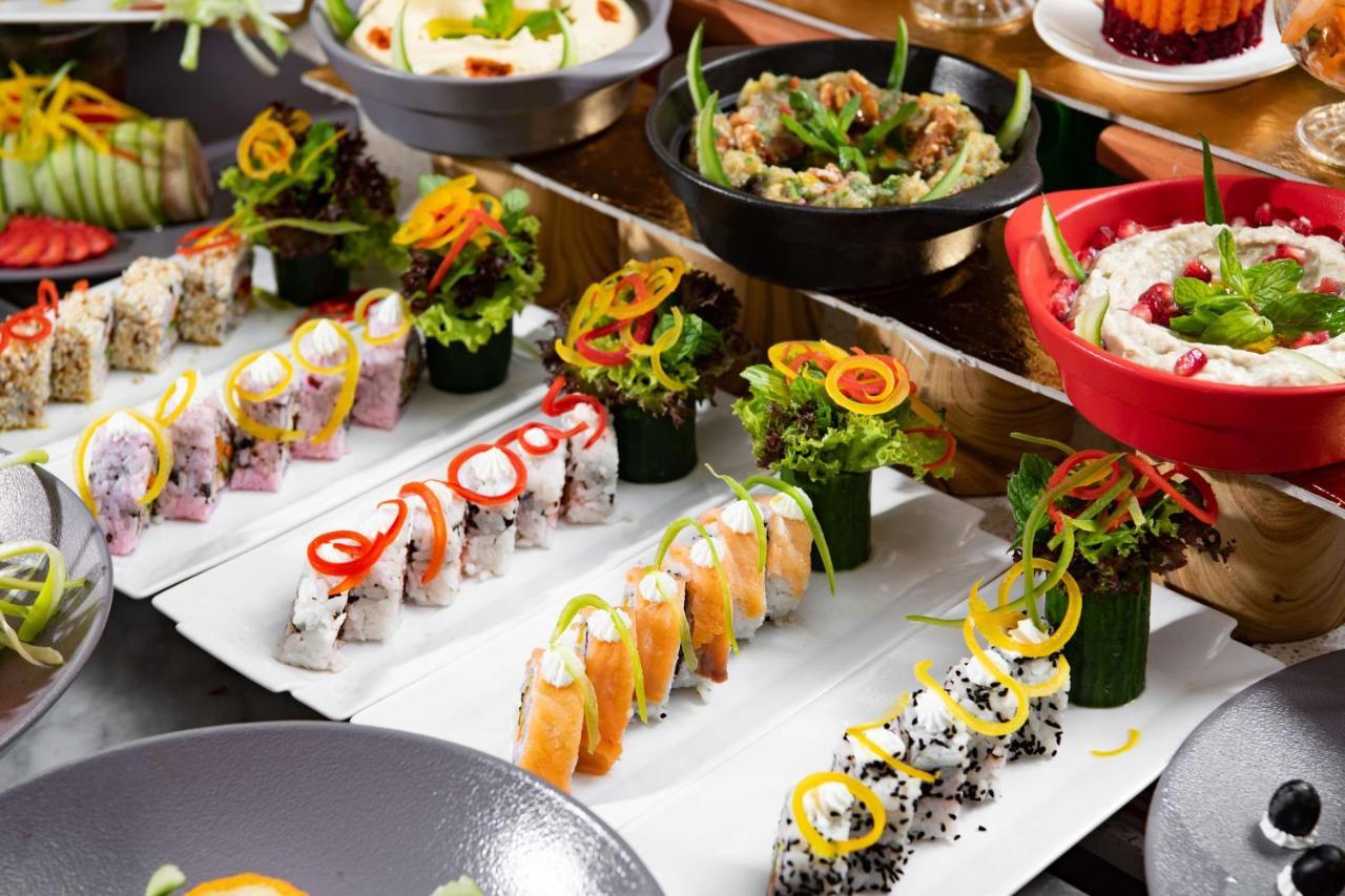 Park Inn By Radisson Makkah Aziziyah Mekka Eksteriør bilde A buffet at a luxury hotel