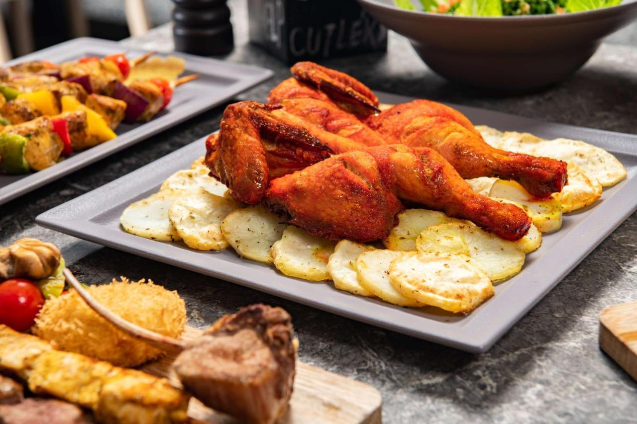 Park Inn By Radisson Makkah Aziziyah Mekka Eksteriør bilde A plate of chicken pakora